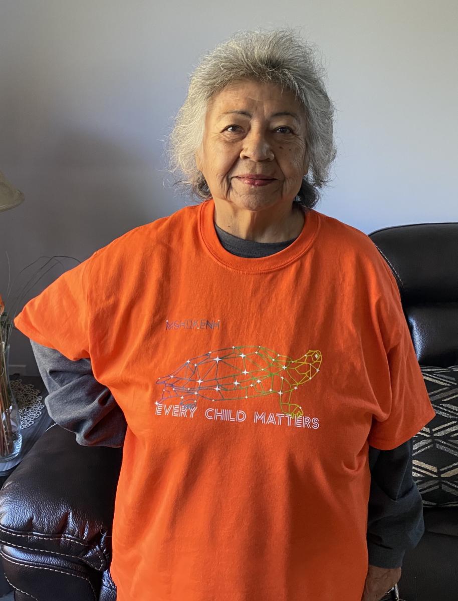 Shirley Williams in orange Every Child Matters shirt