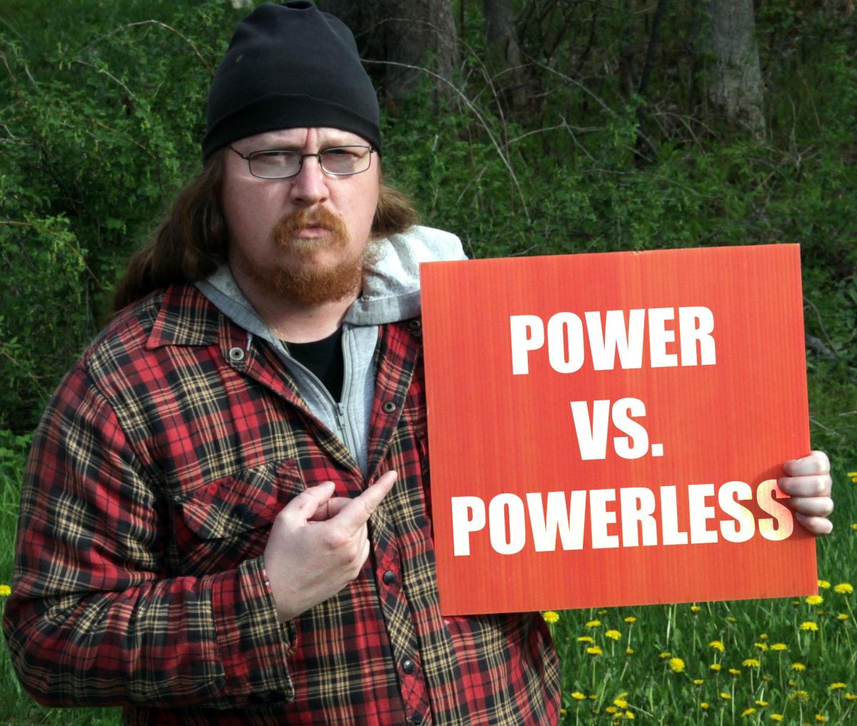 Clayton Windatt holding power vs powerless sign